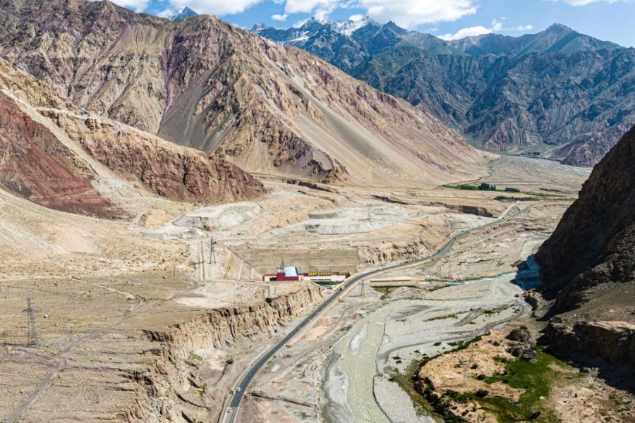 Karakul Lake with Muztagh Ata mountain along Pamir Plateau travel route Karakul Lake with Muztagh Ata mountain along Pamir Plateau travel route
