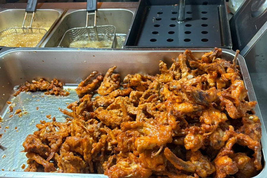 Xinjiang grilled chicken rack night market barbecue stall in Urumqi