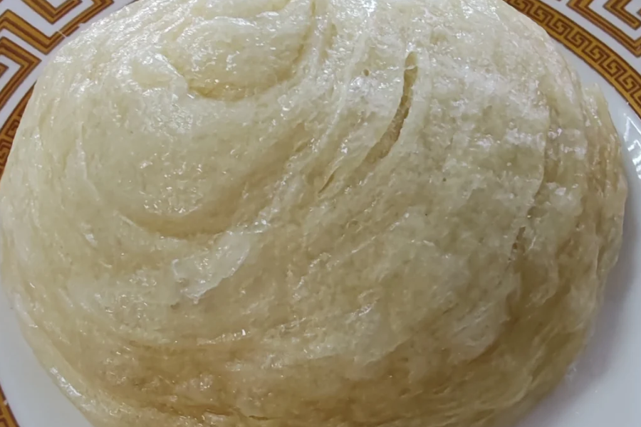 Fresh Youtazi steamed layered bread in a traditional Xinjiang breakfast restaurant Fresh Youtazi steamed layered bread in a traditional Xinjiang breakfast restaurant