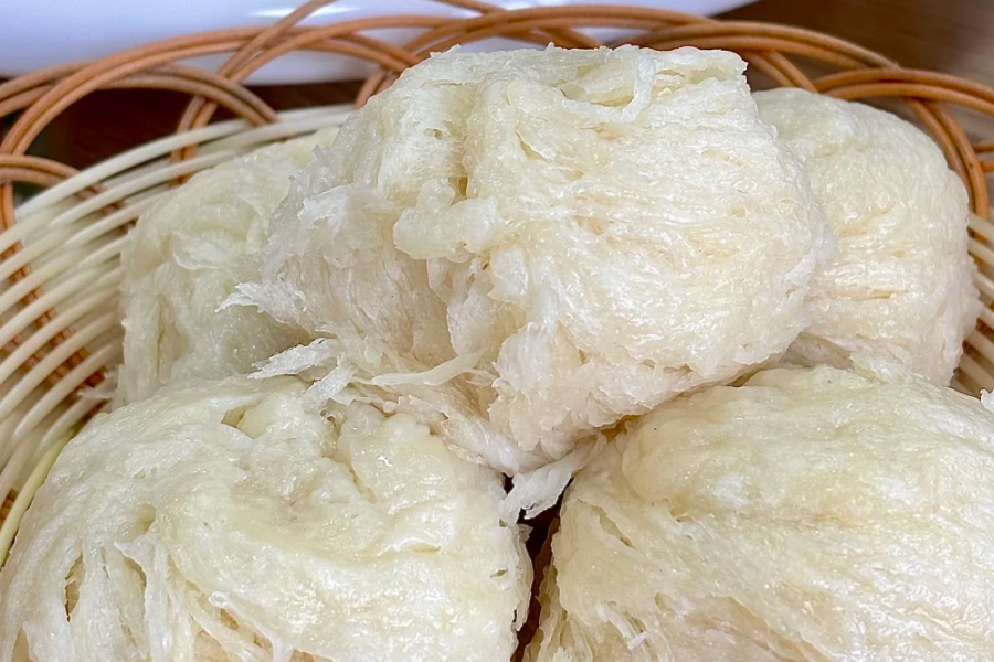 Youtazi steamed layered bread served with meatball soup in Xinjiang