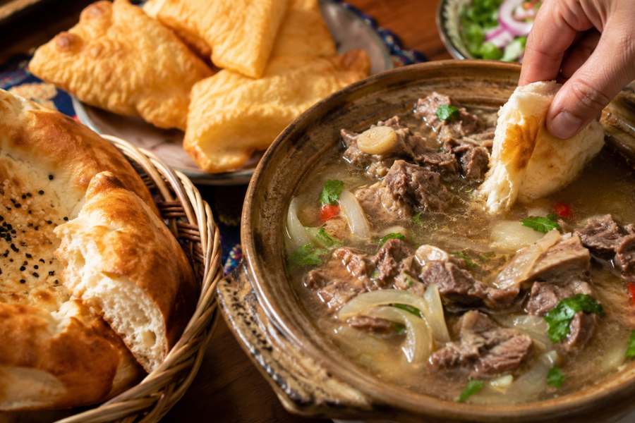 Nang and youtazi served with Xinjiang Lamb Clay Pot broth