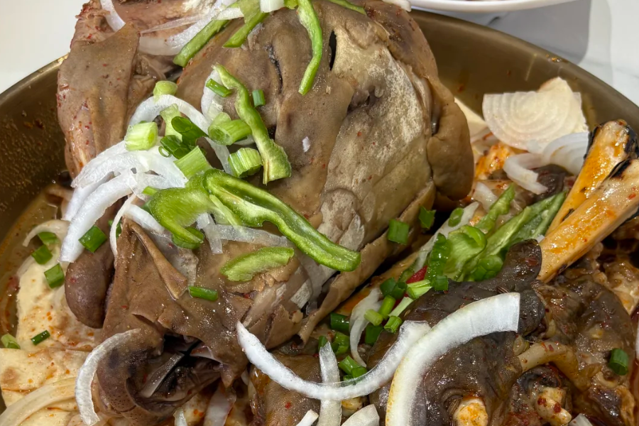 Grilled Lamb Trotters in a Xinjiang night market barbecue street Grilled Lamb Trotters in a Xinjiang night market barbecue street