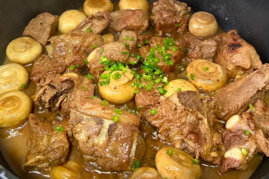 Mushroom Stew served in a rustic bowl with creamy broth and mushrooms, highlighting traditional comfort food texture