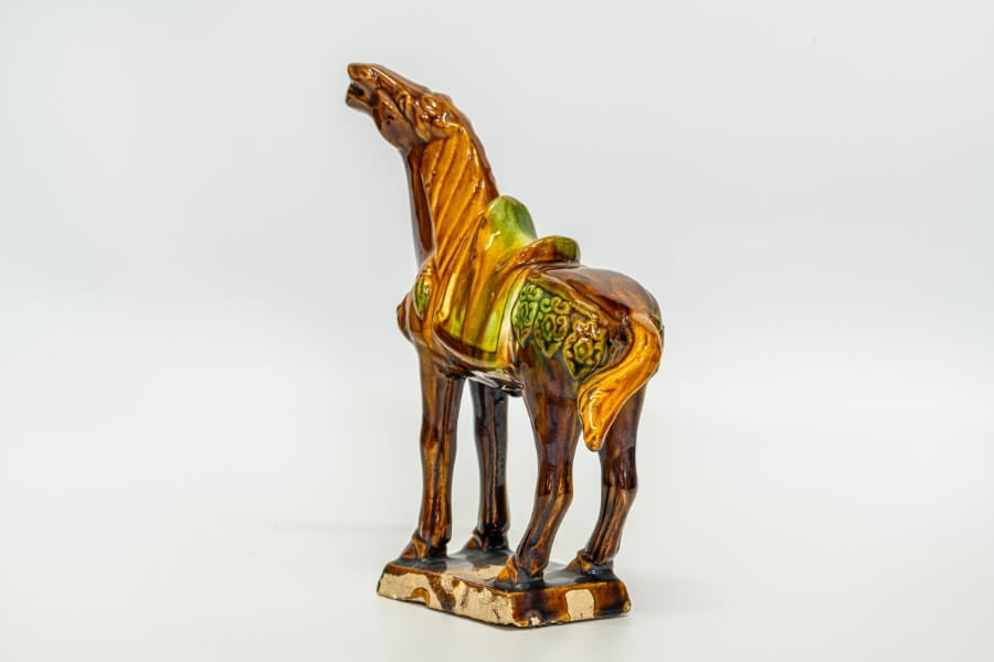 Tang Dynasty horse statue representing Horse symbolism in Chinese culture Tang Dynasty horse statue representing Horse symbolism in Chinese culture