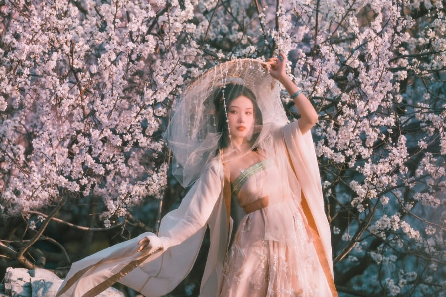Travelers exploring traditional Chinese clothing including Hanfu and Qipao in China during festivals and cultural events