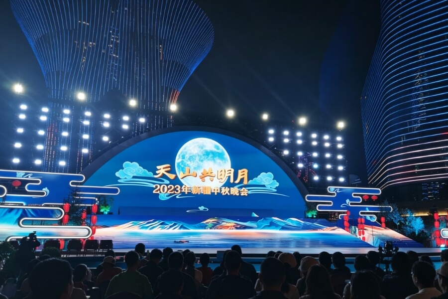 Xinjiang Mid-Autumn Festival celebration with local food and mooncakes