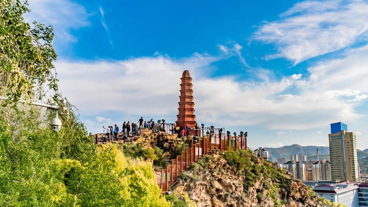 Hongshan Park overlooking downtown Urumqi with Red Hill Pagoda and distant Tianshan Mountains